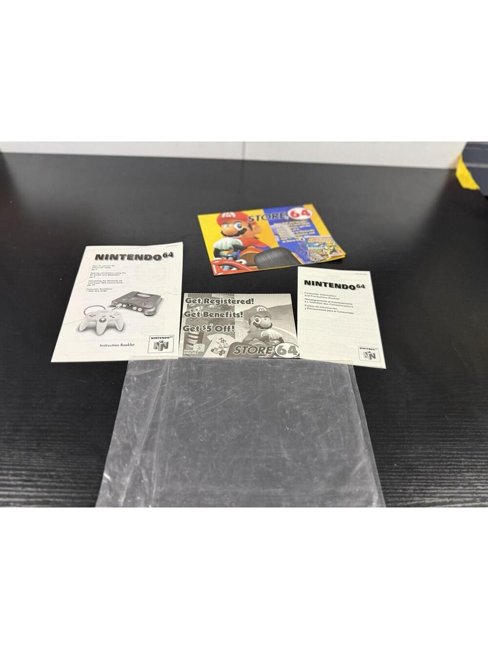 N64 Paperwork: Registration Card, Store64 Pamphlet, Instruction Booklet
